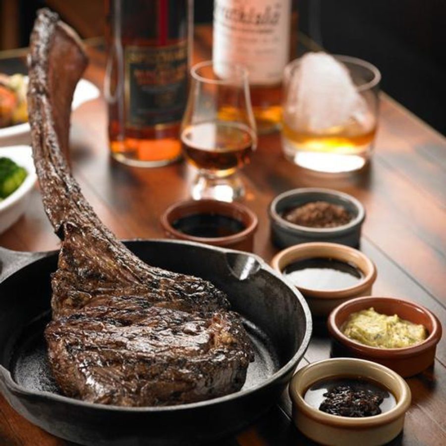 Bedrock Bar & Grill's Tomahawk Steak & Wine Set ($288) from Bedrock Bar & Grill- a fine dining restaurant delivered islandwide in Singapore powered by Oddle.