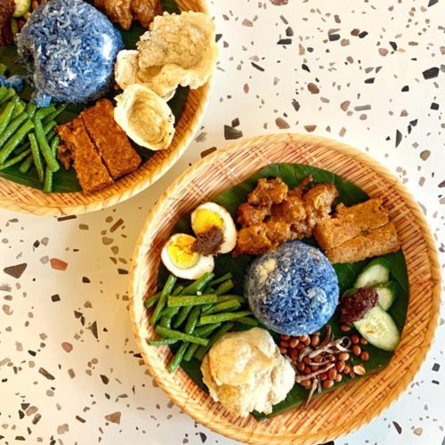 A plate of  Rendang Curry with Blue Pea Nasi Lemak by Grove, delivered islandwide in Singapore powered by Oddle.