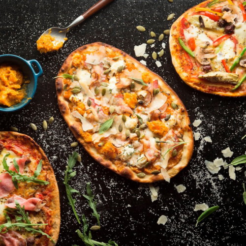 Pumpkin & Bacon Pizza ($26) and Garden Vegetable Pizza ($24) areavailable on Oddle Eats for delivery.