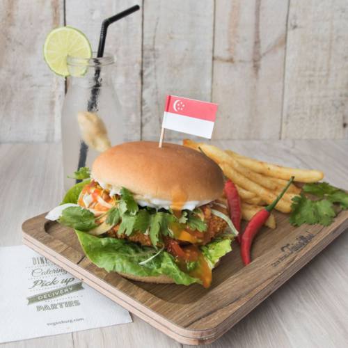 A vegan burger with fries on the side. The Chilli Krab Burg by VerganBurg, delivered islandwide in Singapore powered by Oddle.
