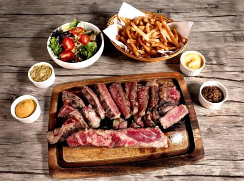 1kg serving of Angus Prime Rib with generous sides of salad and fries delivered islandwide in Singapore powered by Oddle