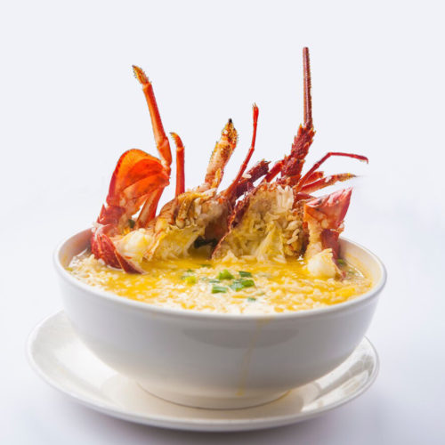 A bowl of lobster porridge. Signature Lobster Porridge from Wan He Lou, delivered islandwide in Singapore powered by Oddle. For sharing platter deliver Singapore.