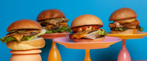 A selection of vegetarian burgers from Love Handle Burgers. Cheeseburger, Mushroom Cheese and Fillet-O-Fishless Combo from Love Handle Burgers, delivered islandwide in Singapore powered by Oddle.