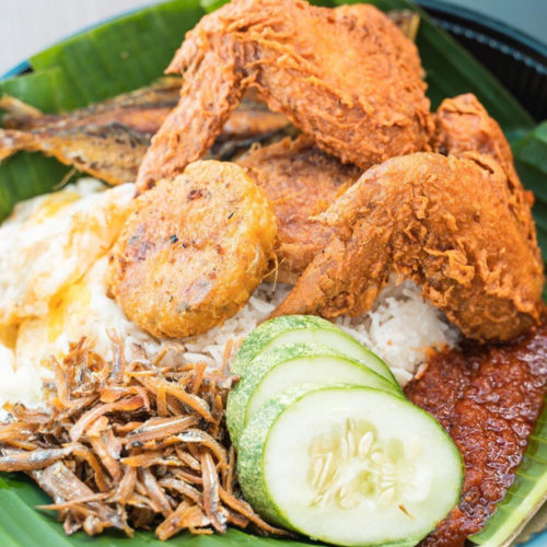 Standard Dulang with kembong fish, begedil & chicken wings. Nasi lemak delivery from Mizzy Corner. Delivered islandwide in Singapore powered by Oddle.