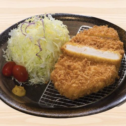A plate of chicken katsu don and salad. Chicken Katsu Don set by Tonkichi, delivered islandwide in Singapore powered by Oddle.