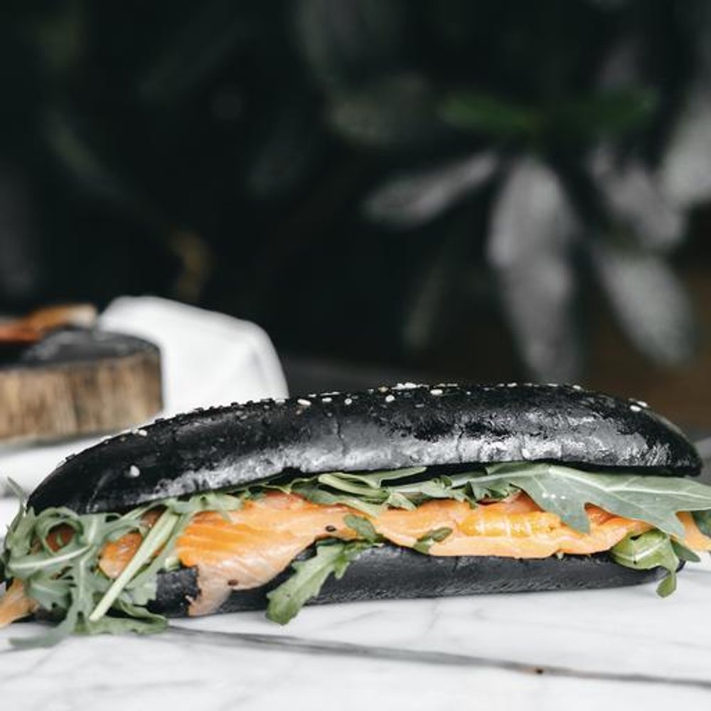 Smoked Salmon Squid Ink Roll from Tiong Bahru Bakery, delivered islandwide in Singapore powered by Oddle.