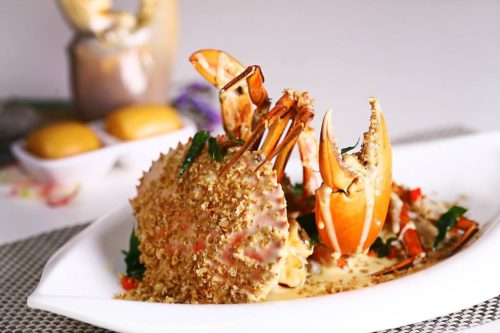Shimmering Sand Crab Delight from Uncle Leong Seafood for what to eat in Punggol, with islandwide delivery in Singapore powered by Oddle.