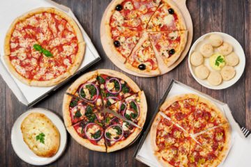 Flatlay of PizzaExpress's pizzas and dough balls, delivered islandwide in Singapore powered by Oddle. For SG food delivery promo, Phase 2.