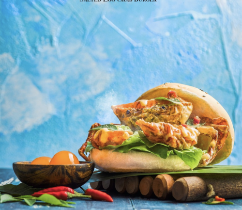 Salted Egg Soft Shell Crab Burger  from Wok In Burger, delivered islandwide in Singapore powered by Oddle. For burger delivery.