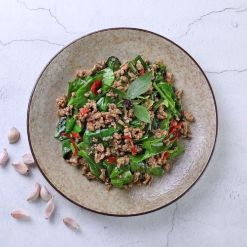 Stir Fried Basil Chicken with Kailan delivered islandwide in Singapore, powered by Oddle. 